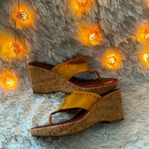 Native-American inspired wedge sandals.